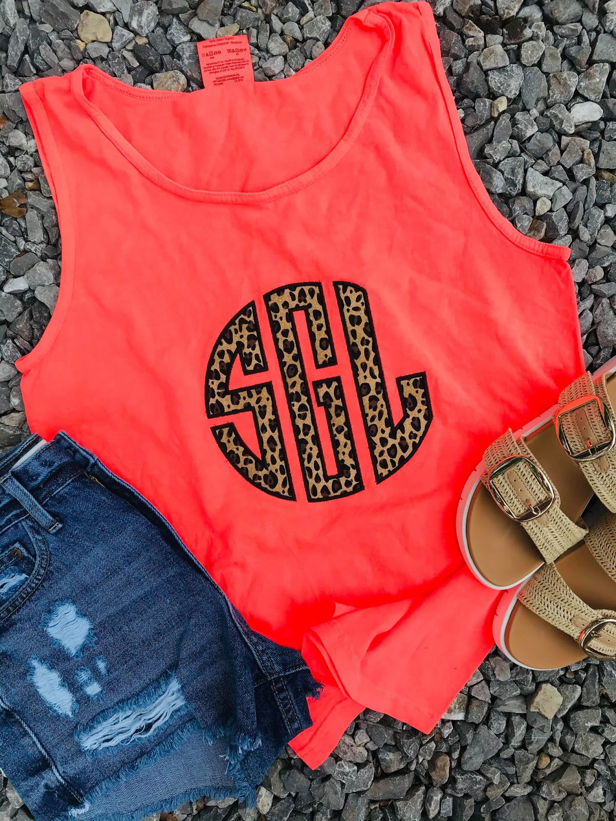 neon red orange top with leopard monogram