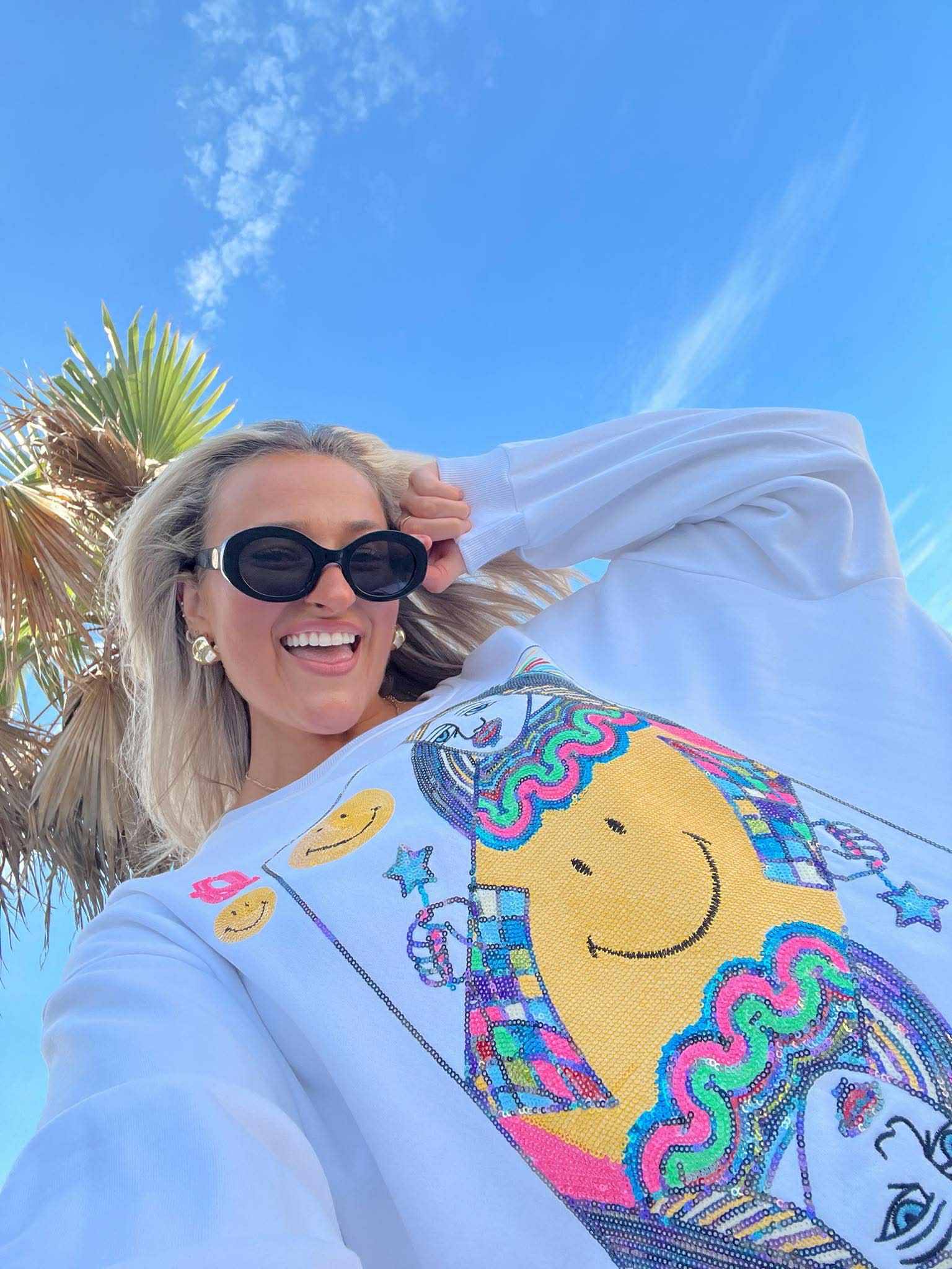 Queen Of Sparkles Licensed White Smiley Queen Card Sweatshirt