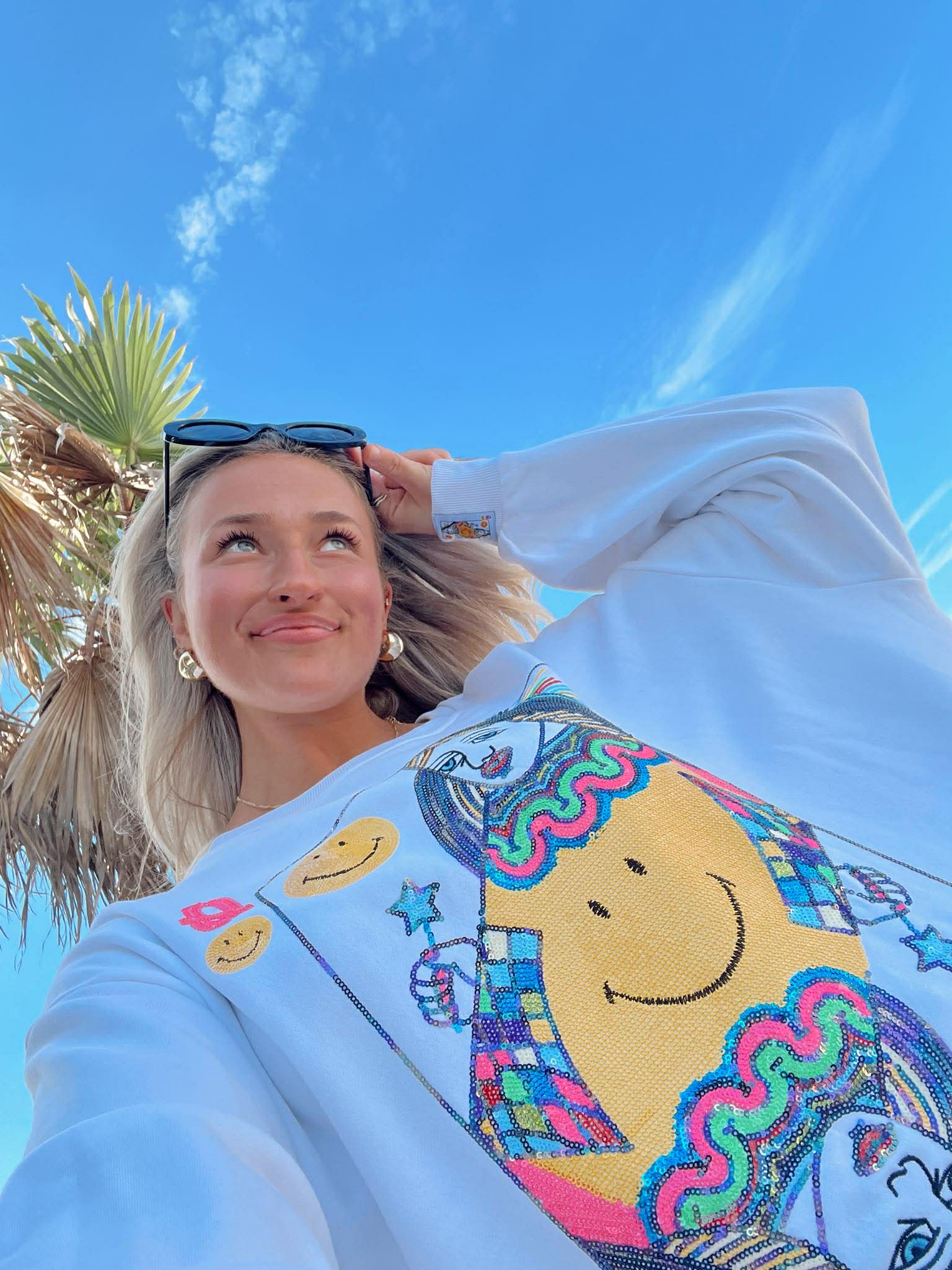 Queen Of Sparkles Licensed White Smiley Queen Card Sweatshirt
