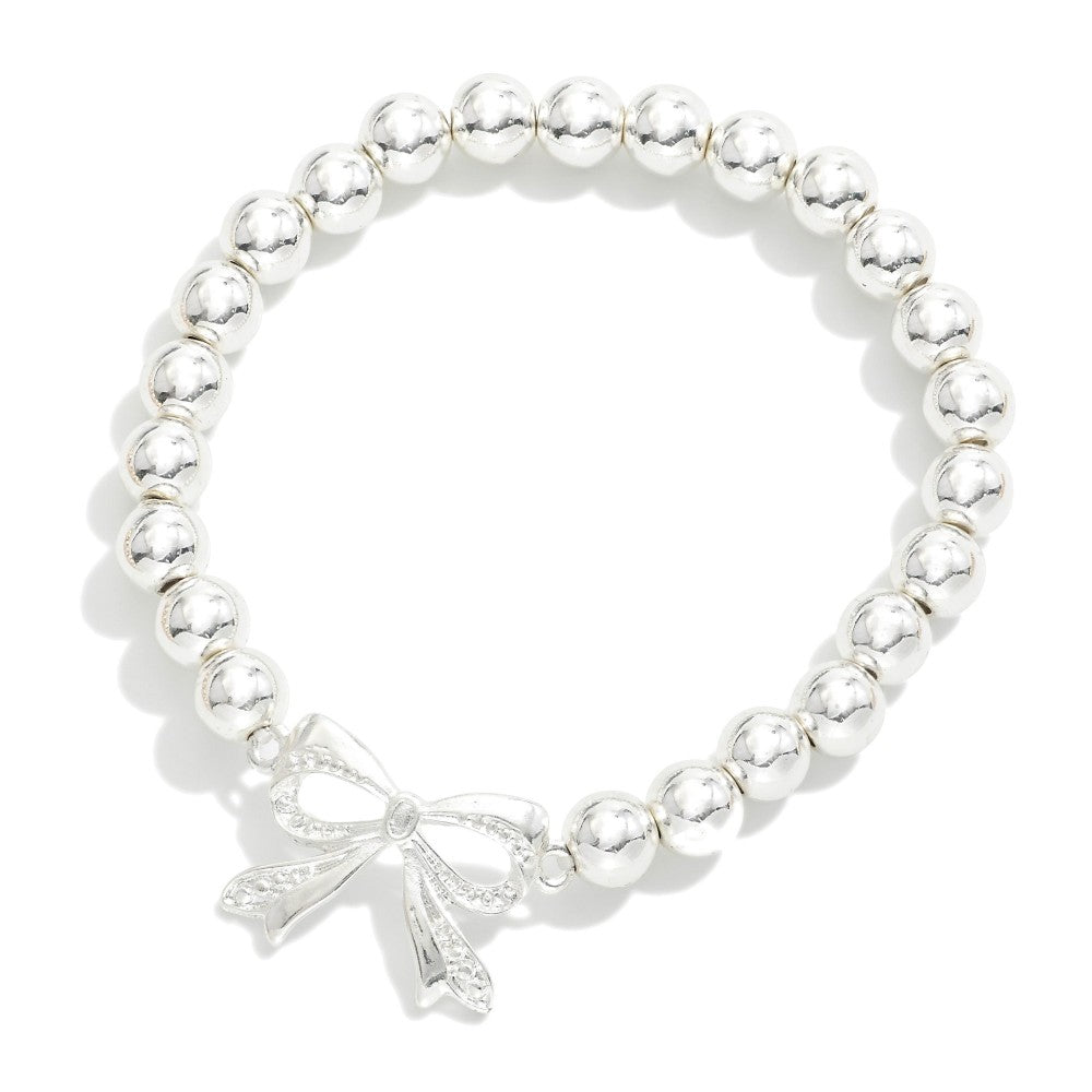 Metal Tone Beaded Stretch Bracelets With Bow Charm